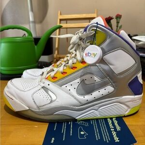 Nike Air Flight Light High-Top Sneakers with White and Silver Accents.